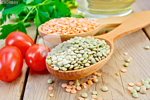 Image of Lentils red and green with tomato on board