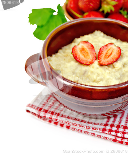 Image of Oatmeal with strawberry on a napkin