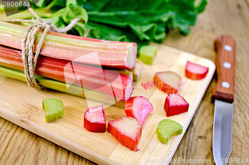 Image of Rhubarb cut on board with sheet