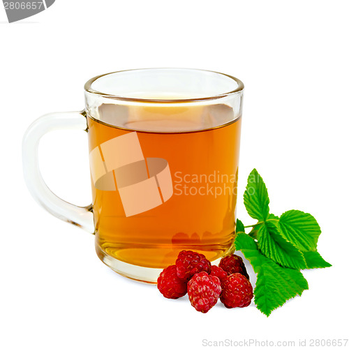 Image of Tea with raspberry in glass mug