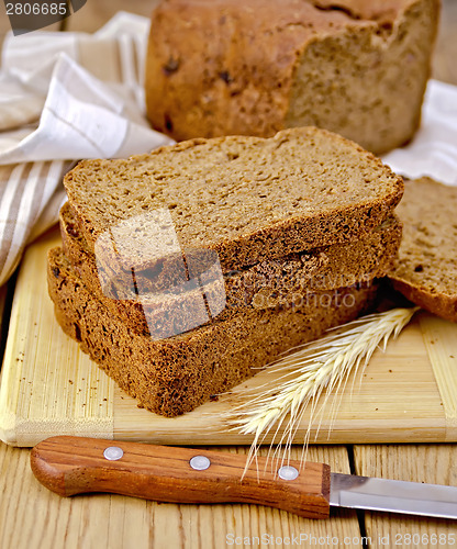 Image of Rye homemade bread with spikelet on board