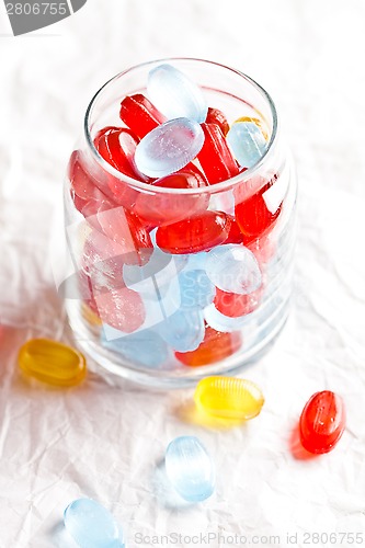 Image of colorful candies in glass jar