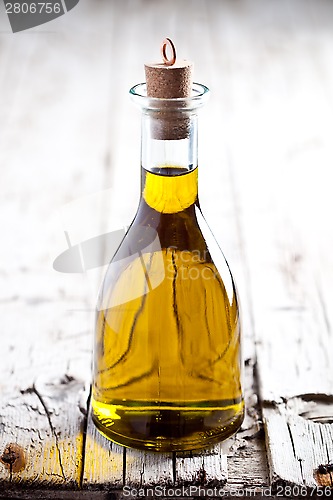 Image of fresh olive oil in bottle 