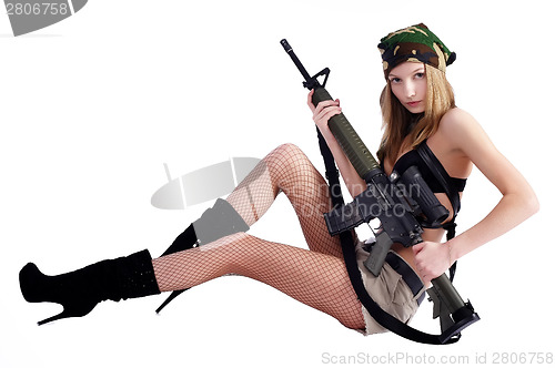 Image of Pretty woman with sniper rifle