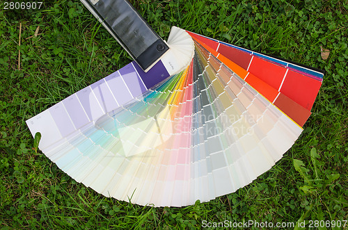 Image of color palette guide on the meadow outdoor 