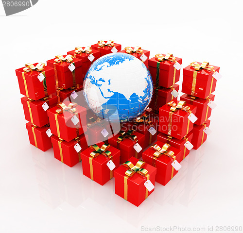 Image of Traditional Christmas gifts and earth. Global holiday concept