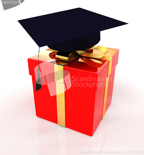 Image of graduation hat on a red gift