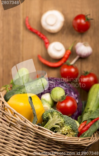 Image of Healthy Organic Vegetables on a Wooden Background