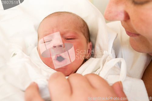 Image of crying newborn baby in the hospital