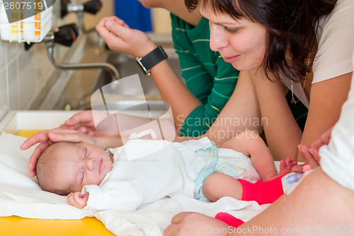 Image of sleeping newborn baby in the hospital