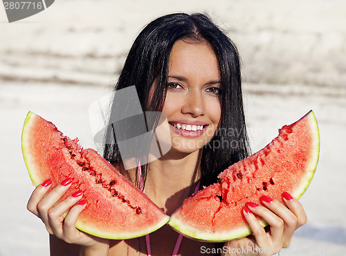 Image of Beautiful girl eats water-melon