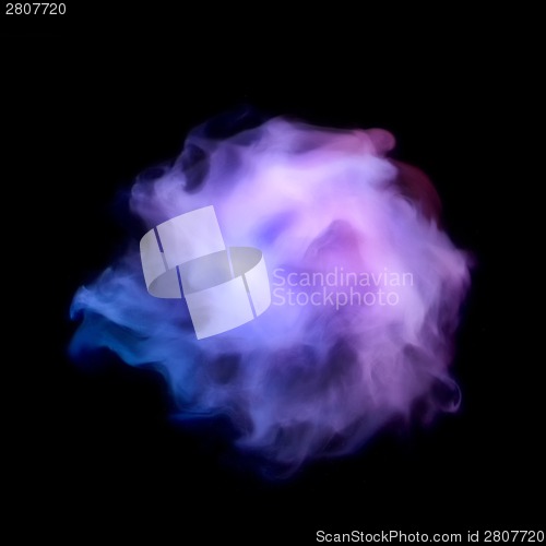 Image of Blue smoke explosion isolated on black