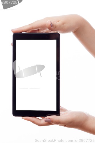 Image of Woman hold tablet PC on white