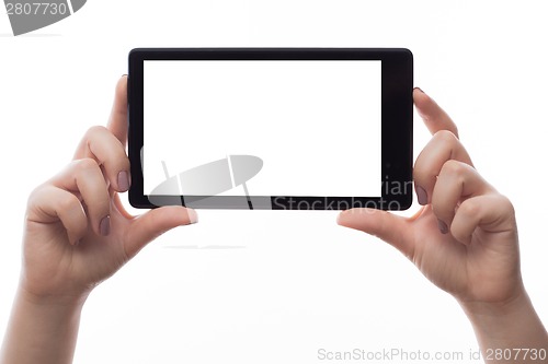 Image of Woman hold tablet PC on white