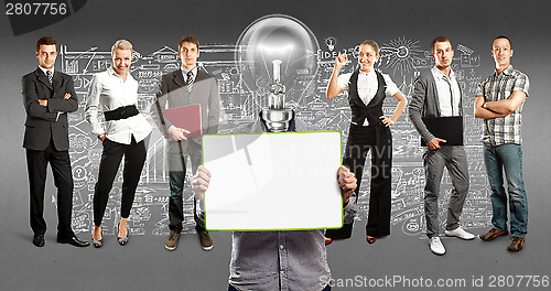 Image of Business Team With Lamp Head