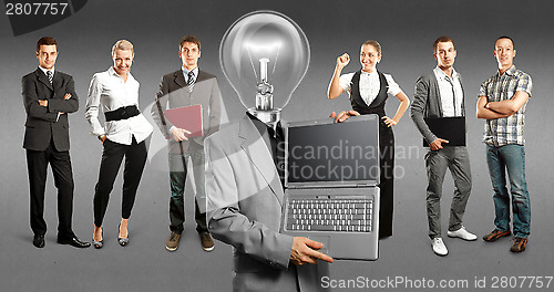 Image of Business Team With Lamp Head