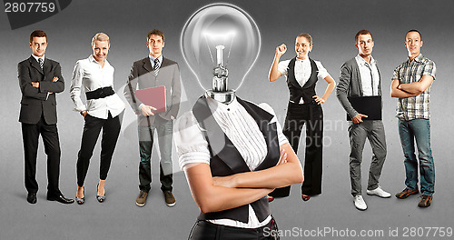 Image of Business Team With Lamp Head