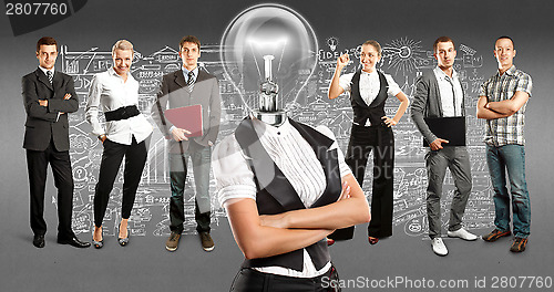 Image of Business Team With Lamp Head