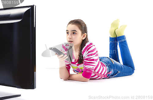 Image of Little girl with remote control