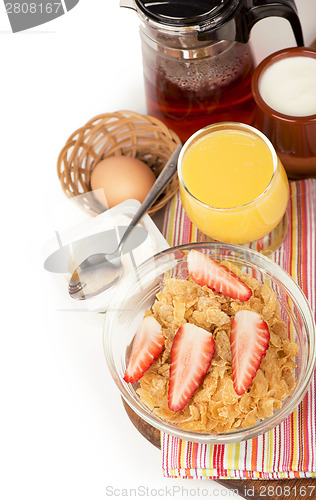 Image of Breakfast including orange juice, muesli and fruits