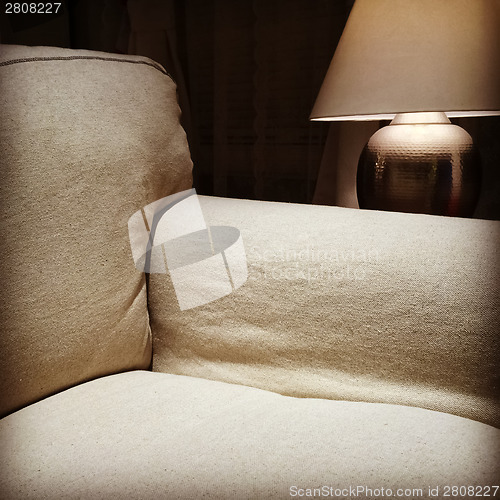 Image of Armchair and cozy lamp