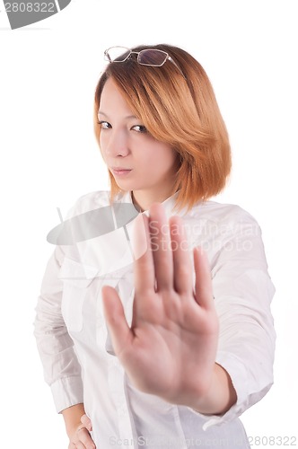 Image of Attractive lady making stop gesture