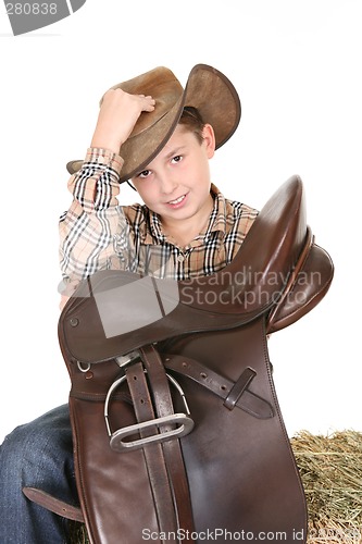 Image of Horse rider tips his hat