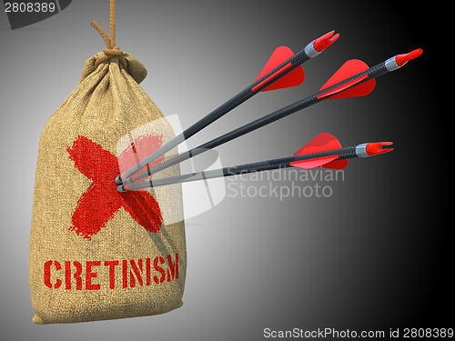Image of Cretinism - Arrows Hit in Red Mark Target.