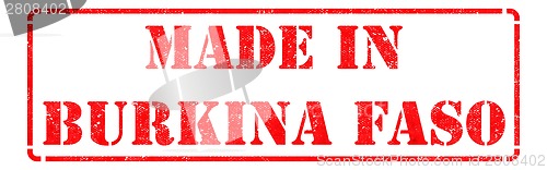 Image of Made in Burkina Faso - inscription on Red Rubber Stamp.