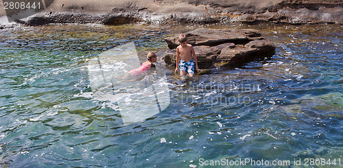 Image of Children swimming in the sea