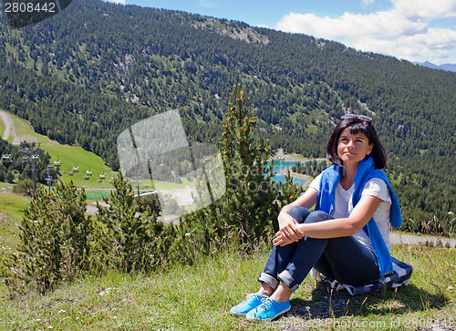 Image of Woman relaxing in the mountain