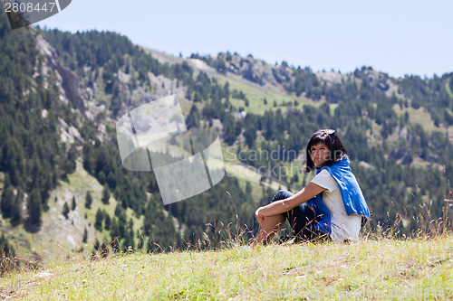 Image of Woman relaxing in the mountain