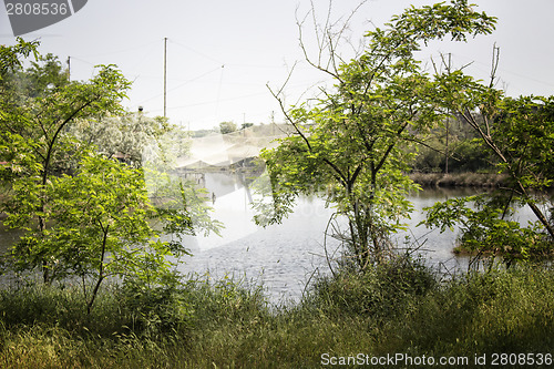 Image of Fishing huts on the lagoon