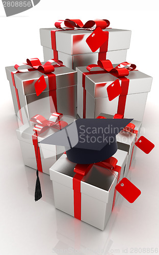 Image of graduation hat and gifts on a white background 