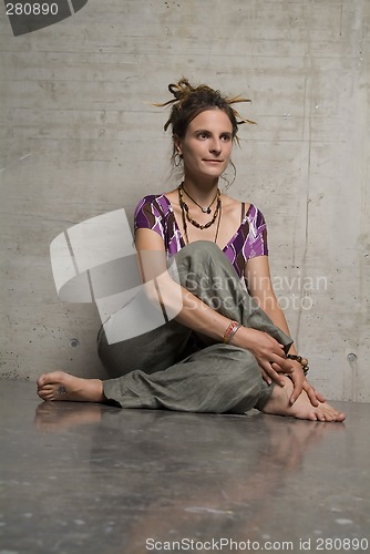 Image of woman sits on the bottom