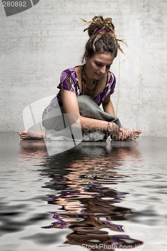 Image of woman sits on the bottom