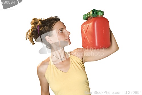 Image of woman looks at petrol can