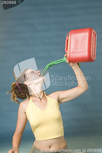 Image of woman drinks of jerry can