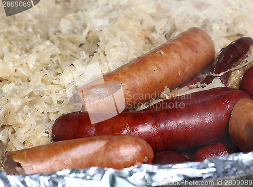 Image of Fried sausage with stewed cabbage