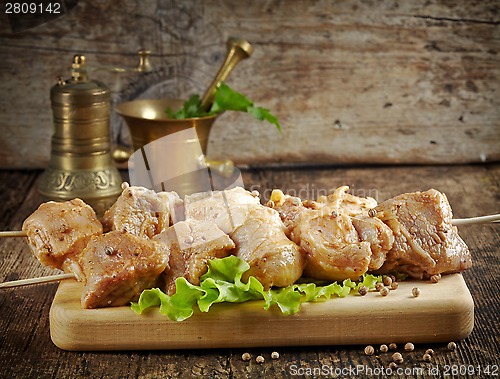 Image of raw marinated pork kebab meat