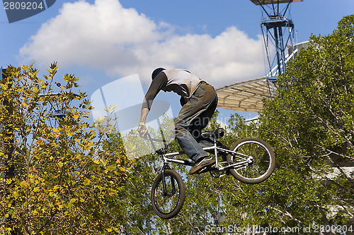 Image of BMX biker airborne