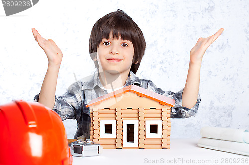 Image of boy built a new house