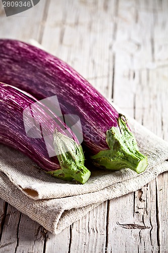 Image of two fresh eggplants 