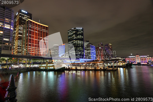 Image of Circular Quay and Sydney City Buildings in colour during Vivid S