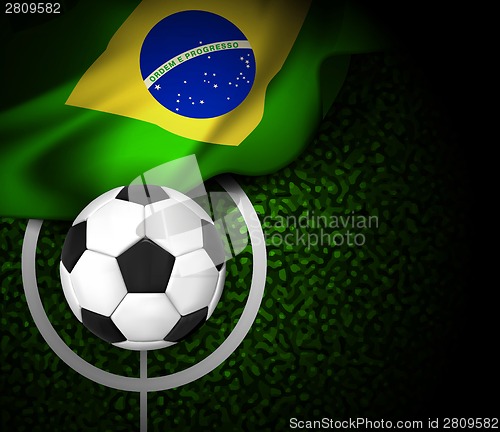 Image of Football field with ball and flag of Brazil