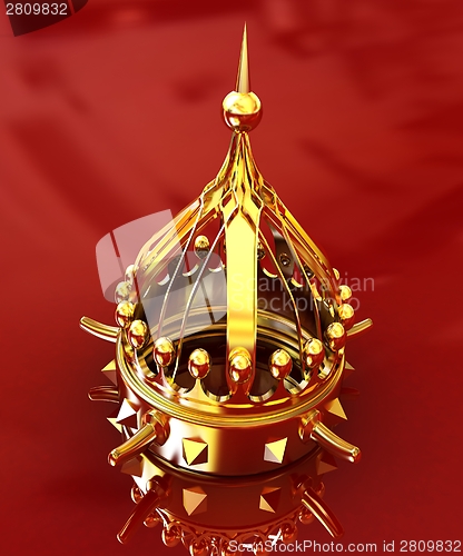 Image of Gold crown isolated on red background 