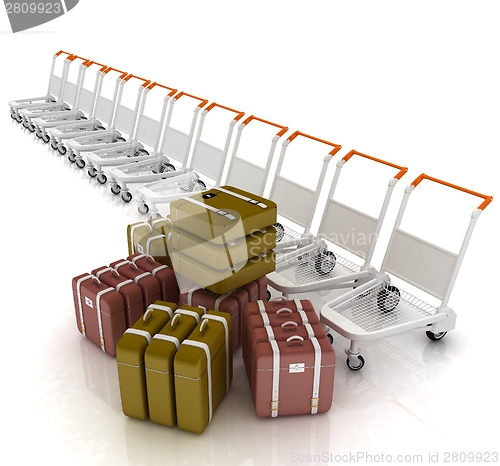 Image of Trolleys for luggages at the airport and luggages 