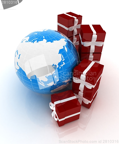 Image of Traditional Christmas gifts and earth. Global holiday concept 