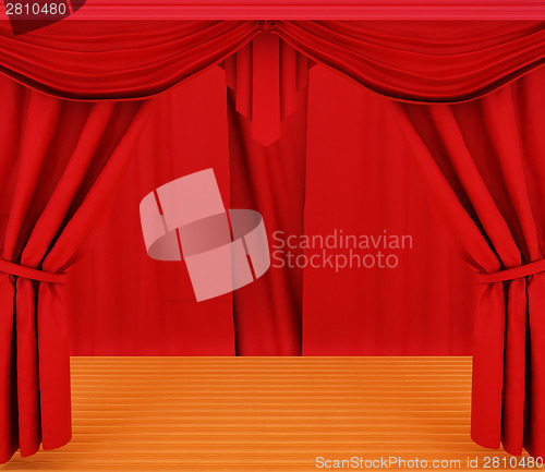 Image of Red curtains and wooden scene floor 