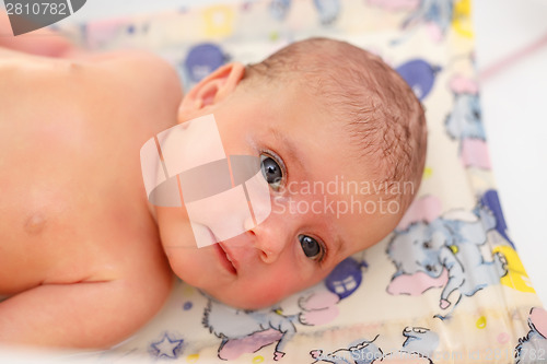 Image of take a bath for a young adorable baby